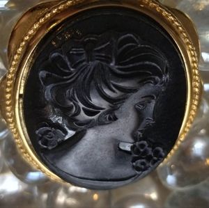 Vintage trifari black cameo brooch with gold tone trim